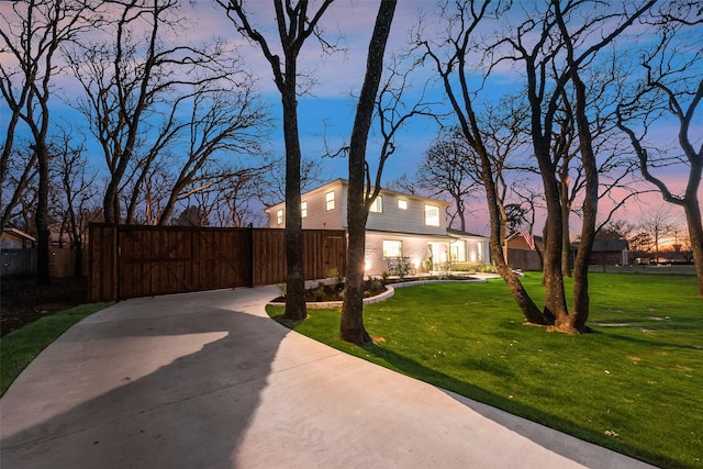 view of yard with fence and a gate