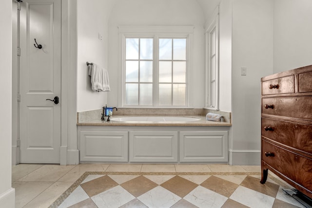 bathroom with a garden tub