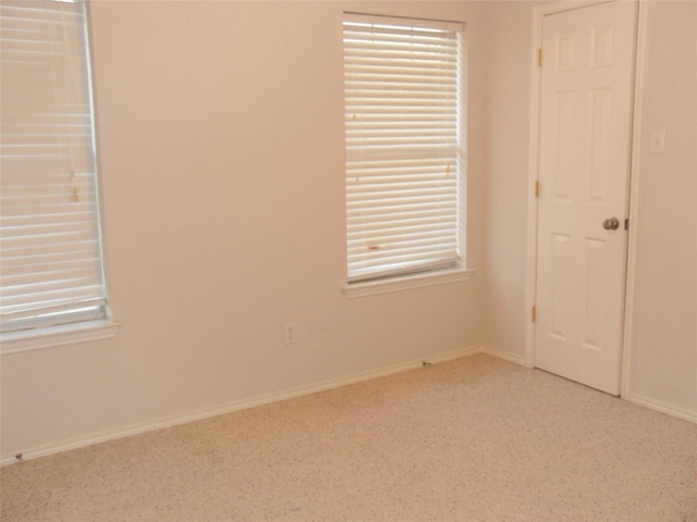 unfurnished bedroom with baseboards