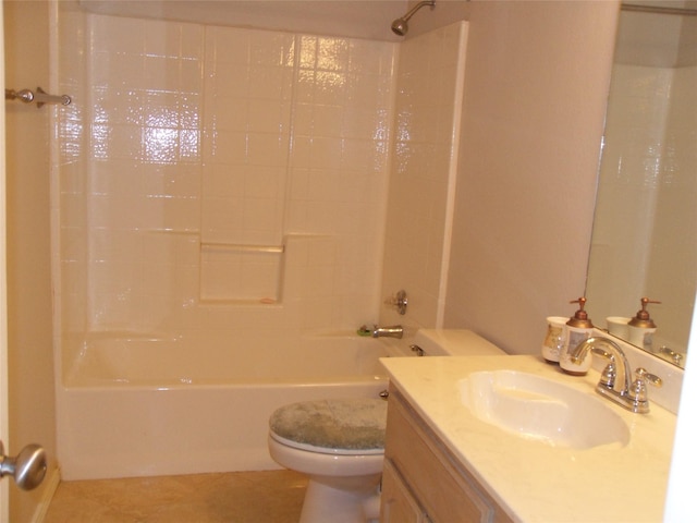 full bath with washtub / shower combination, tile patterned flooring, vanity, and toilet