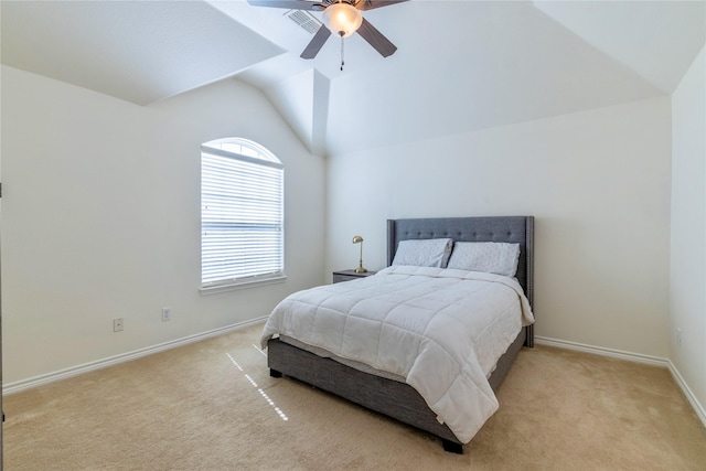 bedroom featuring vaulted ceiling, carpet, baseboards, and a ceiling fan