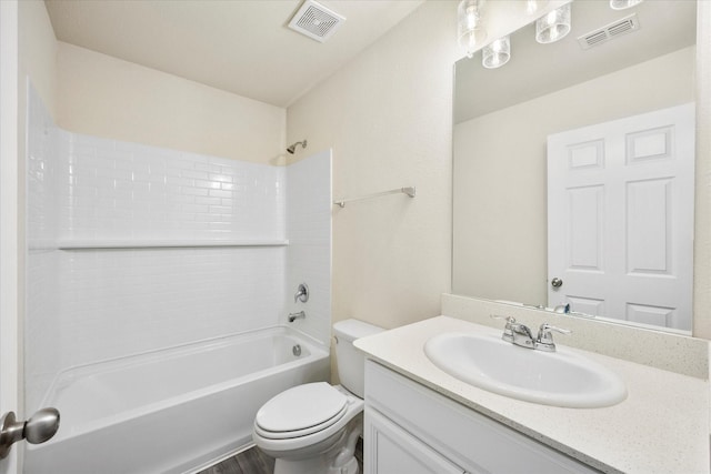 full bathroom with toilet, washtub / shower combination, vanity, and visible vents