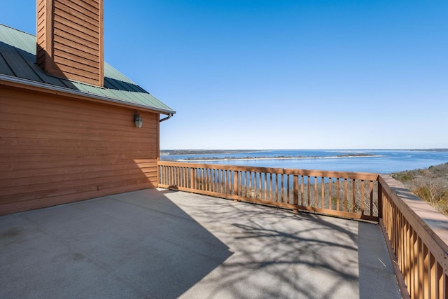 view of patio / terrace featuring a water view