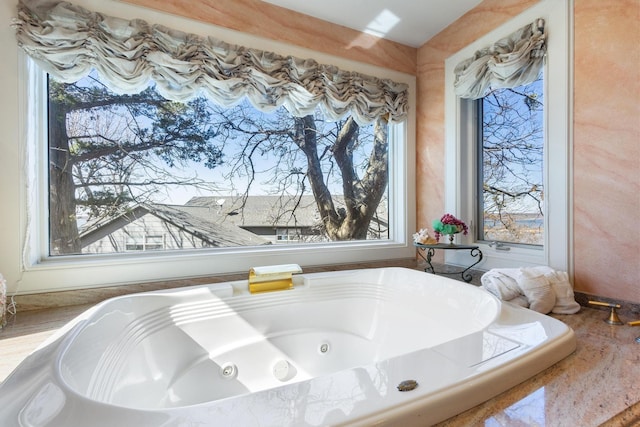 bathroom featuring a jetted tub