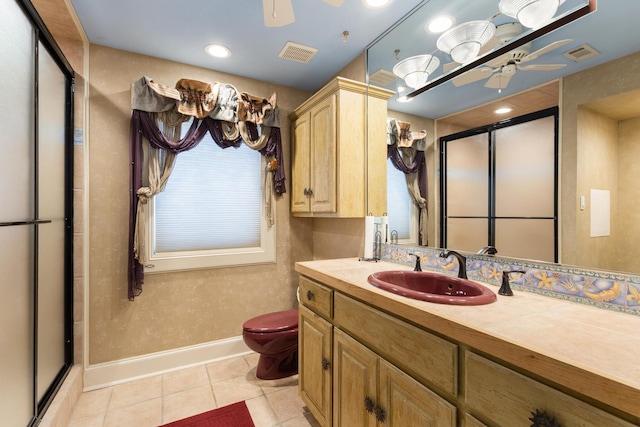 full bathroom featuring ceiling fan, visible vents, and tile patterned flooring