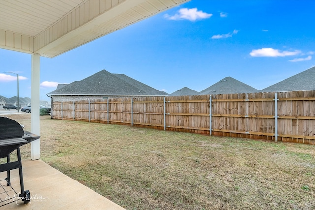 view of yard with fence