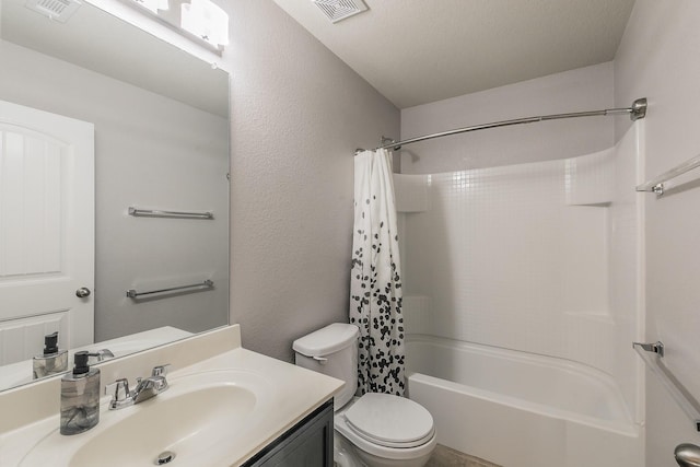 full bath featuring visible vents, shower / tub combo with curtain, vanity, and toilet