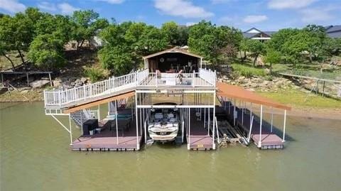 dock area with a water view