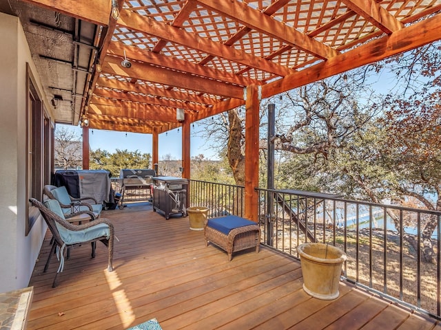 wooden deck with a pergola