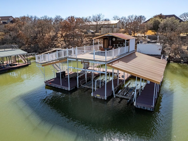 dock area featuring a water view and boat lift