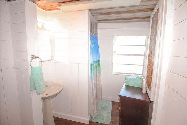 bathroom with a shower with shower curtain