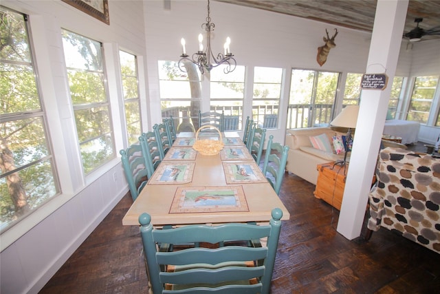 sunroom / solarium with a notable chandelier and a healthy amount of sunlight