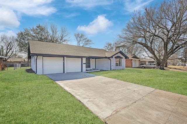 ranch-style home with driveway, brick siding, an attached garage, and a front yard