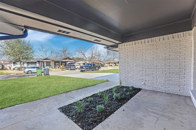 view of patio / terrace featuring a residential view