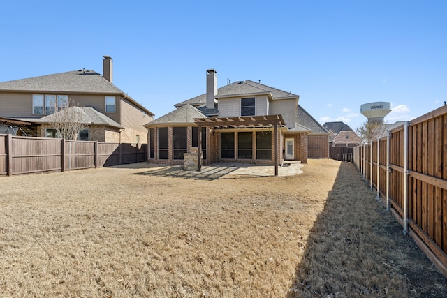 back of property featuring a pergola, a patio, a fenced backyard, a shingled roof, and brick siding