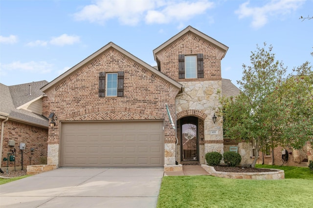 view of front of property with brick siding, a shingled roof, concrete driveway, stone siding, and a front yard