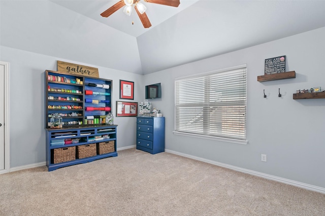 playroom featuring a ceiling fan, carpet, vaulted ceiling, and baseboards