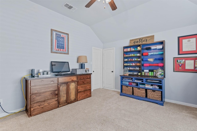 office with lofted ceiling, carpet flooring, visible vents, and baseboards