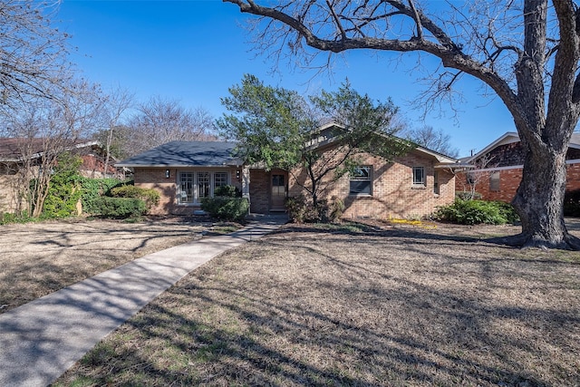 ranch-style home with brick siding