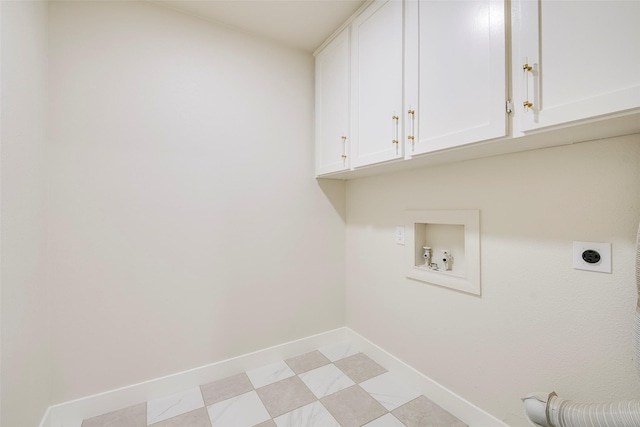 washroom with washer hookup, light floors, cabinet space, electric dryer hookup, and baseboards