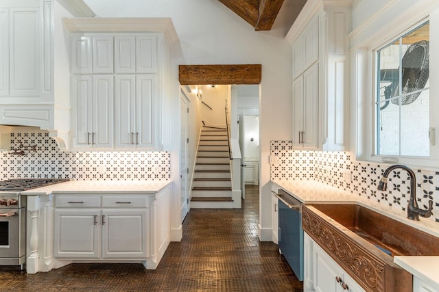 704 Glade Park Ct, Azle, TX 76020 - kitchen with stainless steel appliances, white cabinetry, and light countertops