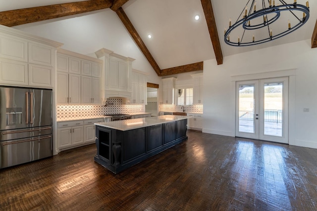 704 Glade Park Ct, Azle, TX 76020 - kitchen featuring high quality fridge, light countertops, white cabinets, french doors, and a center island