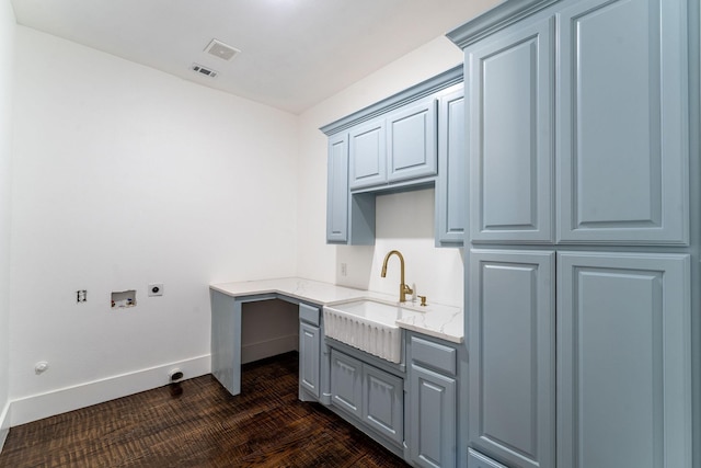 704 Glade Park Ct, Azle, TX 76020 - washroom featuring electric dryer hookup, washer hookup, cabinet space, and hookup for a gas dryer