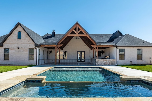 704 Glade Park Ct, Azle, TX 76020 - view of swimming pool with a pool with connected hot tub and a patio