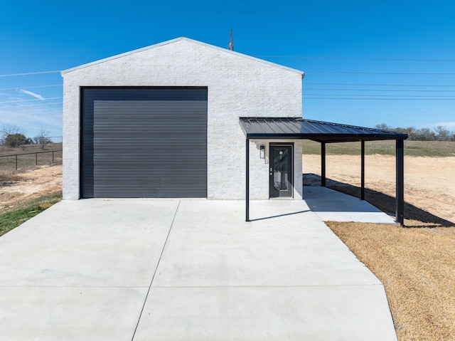 704 Glade Park Ct, Azle, TX 76020 - detached garage featuring concrete driveway