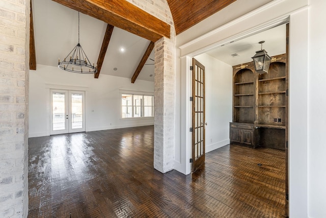 704 Glade Park Ct, Azle, TX 76020 - unfurnished living room with french doors, wood finished floors, beamed ceiling, high vaulted ceiling, and a chandelier