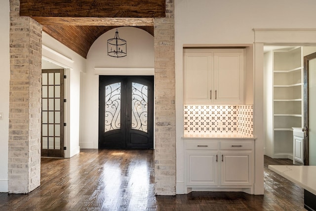 704 Glade Park Ct, Azle, TX 76020 - entryway featuring french doors, dark wood-style flooring, and lofted ceiling