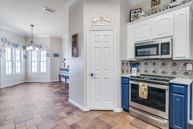 kitchen featuring crown molding, decorative backsplash, appliances with stainless steel finishes, white cabinets, and blue cabinets