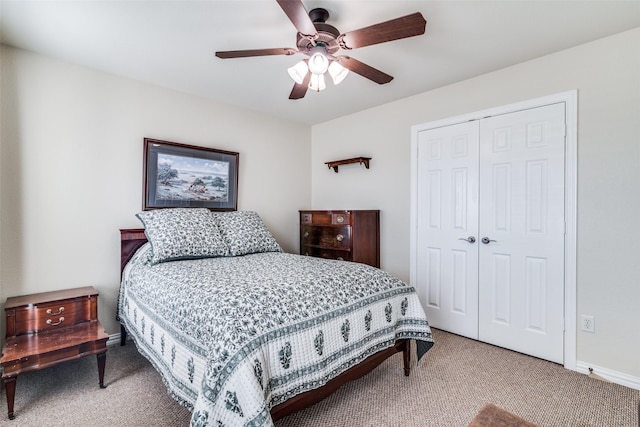 bedroom featuring carpet floors, a closet, a ceiling fan, and baseboards