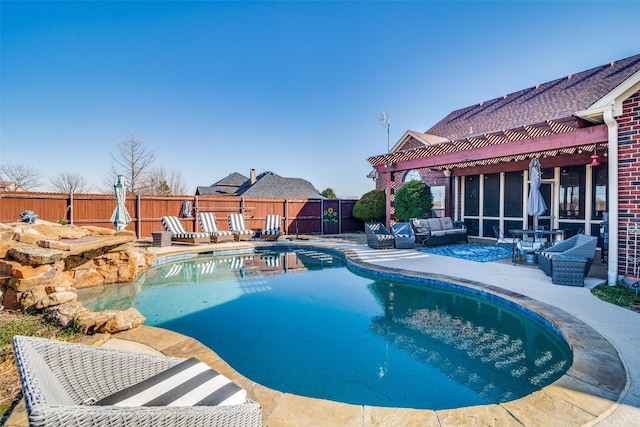 view of pool featuring a fenced backyard, an outdoor hangout area, a fenced in pool, a pergola, and a patio area