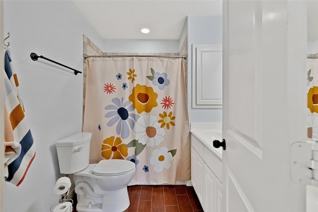 214 Willow Creek Dr, Weatherford, TX 76085 - full bathroom featuring toilet, curtained shower, wood tiled floor, and vanity