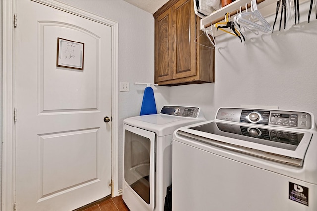 214 Willow Creek Dr, Weatherford, TX 76085 - washroom featuring cabinet space, wood finished floors, and independent washer and dryer
