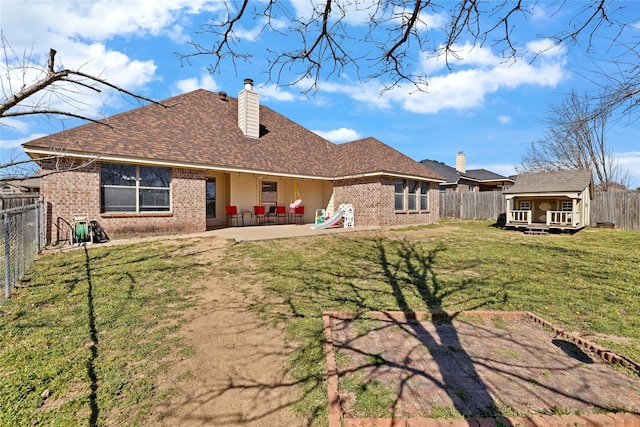 214 Willow Creek Dr, Weatherford, TX 76085 - rear view of property with a fenced backyard and brick siding