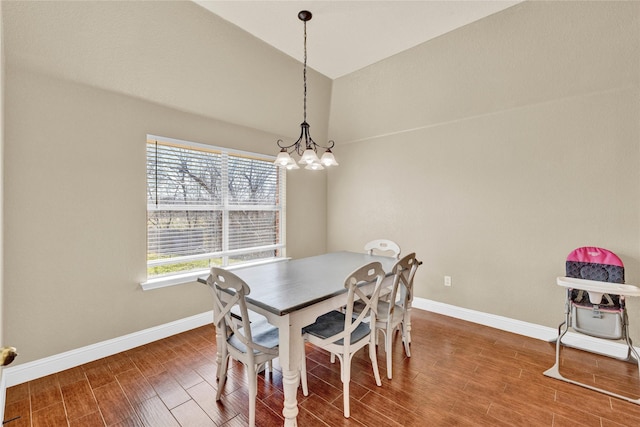 214 Willow Creek Dr, Weatherford, TX 76085 - dining area featuring lofted ceiling, baseboards, a notable chandelier, and wood tiled floor