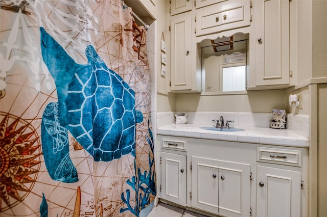 full bathroom with vanity and a shower with shower curtain