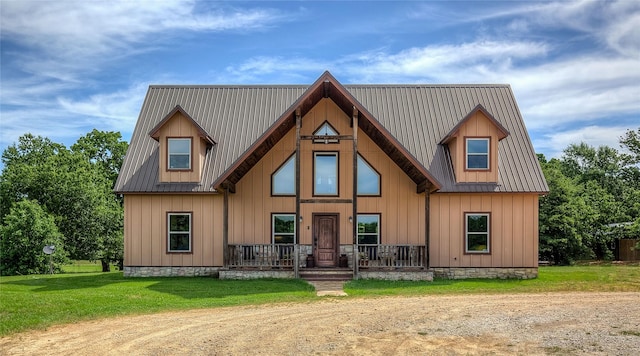 3780 Texas Highway 11 W, Sulphur Springs, TX 75482 - back of house featuring a porch, board and batten siding, and a lawn
