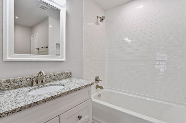 full bath featuring visible vents, shower / bathing tub combination, and vanity