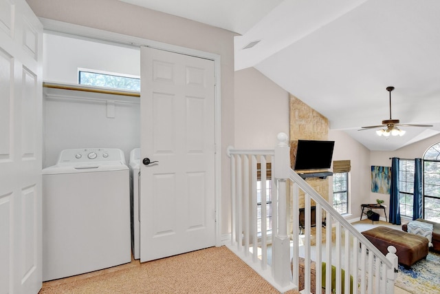 clothes washing area with laundry area, visible vents, washer / clothes dryer, and a ceiling fan