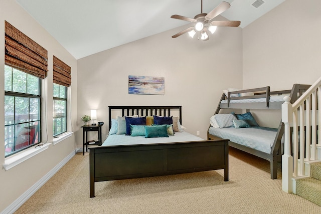 bedroom featuring lofted ceiling, visible vents, a ceiling fan, light carpet, and baseboards