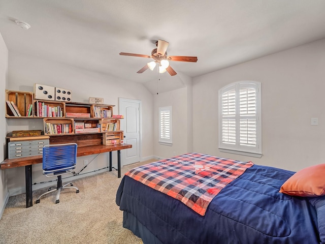 bedroom with carpet and vaulted ceiling