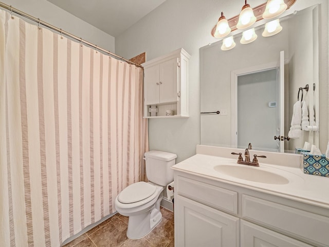 bathroom with tile patterned flooring, a shower with shower curtain, vanity, and toilet