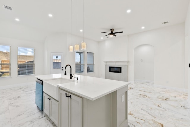 kitchen with recessed lighting, marble finish floor, visible vents, and dishwasher