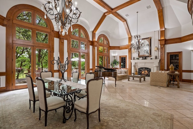900 Kingsbury Way, Southlake, TX 76092 - dining space featuring a chandelier, high vaulted ceiling, a warm lit fireplace, french doors, and beam ceiling