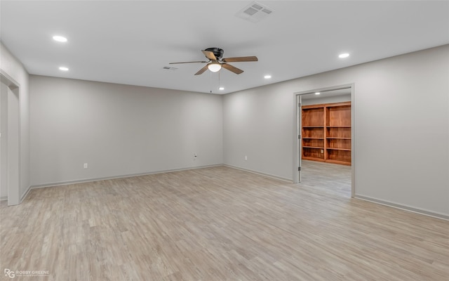 spare room with baseboards, visible vents, a ceiling fan, light wood-style floors, and recessed lighting