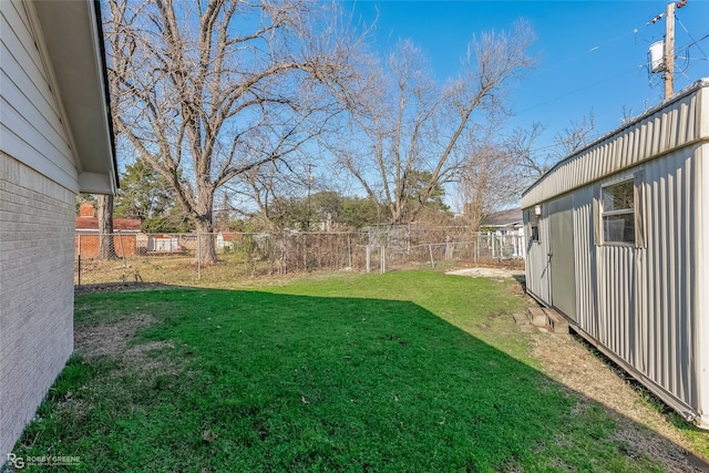 view of yard with a fenced backyard