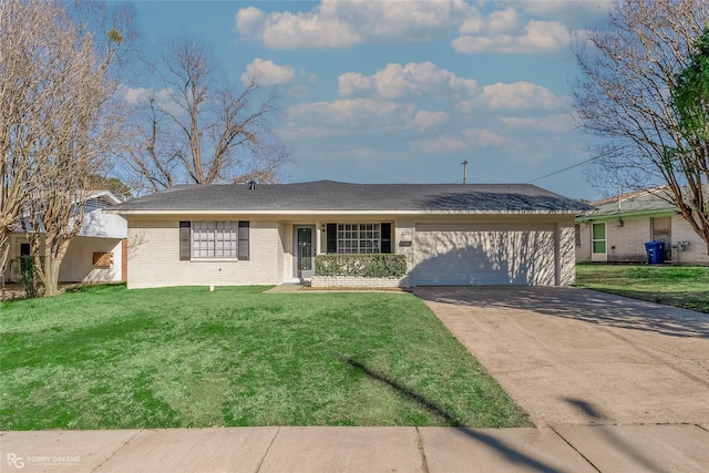 single story home with driveway, brick siding, an attached garage, and a front yard